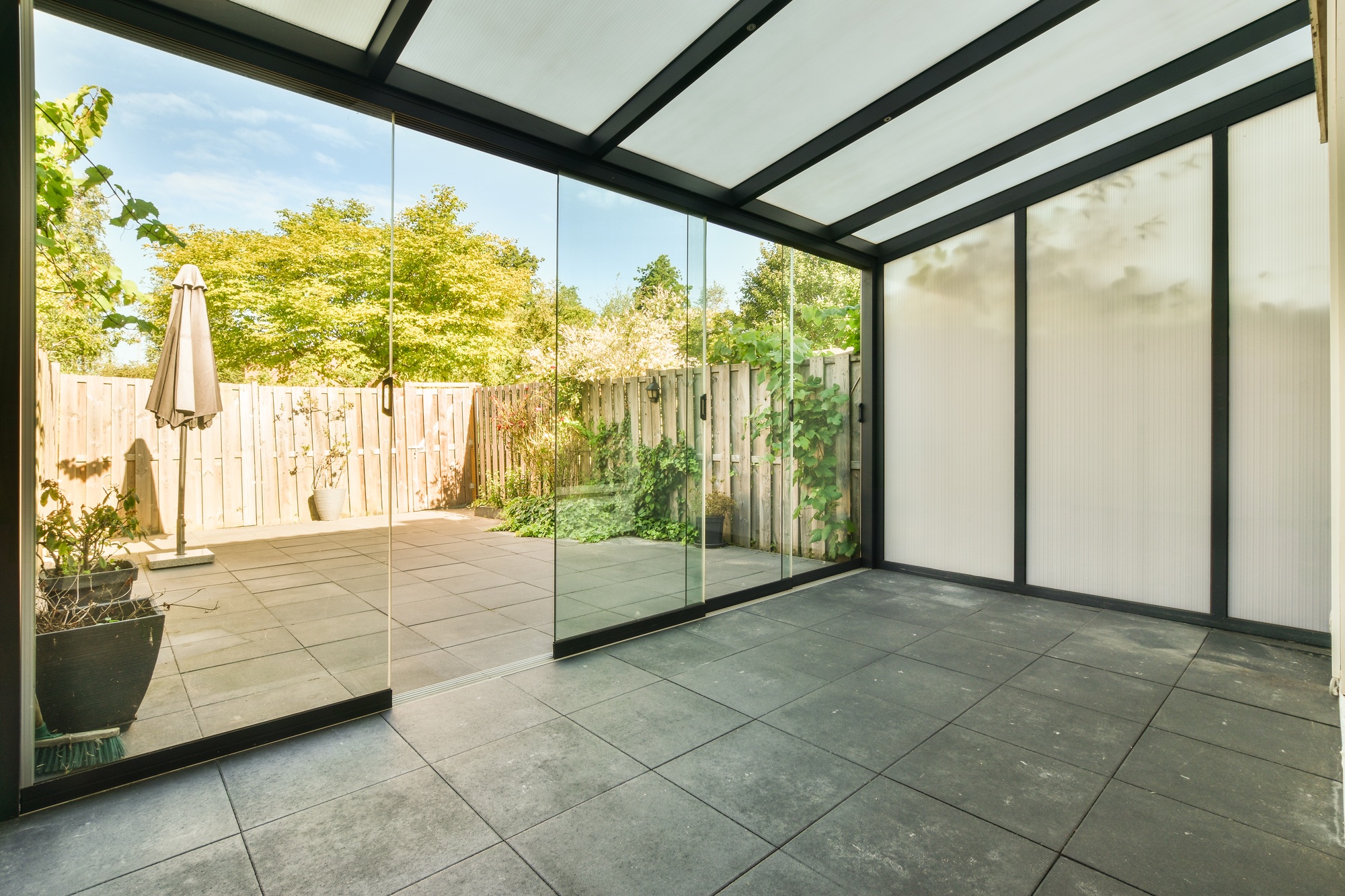 Glass wall in terrace between rooms in home